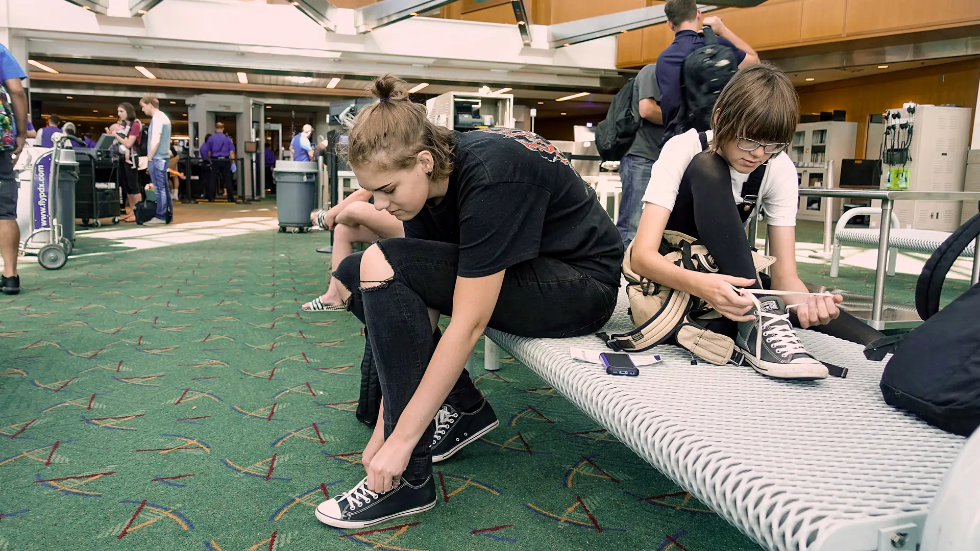 tying shoes airport security.jpg 1